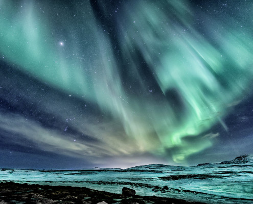Northern Lights shining, shoot on the mountain roat to Þingvellir National Part in Iceland. (Johannes Frank)