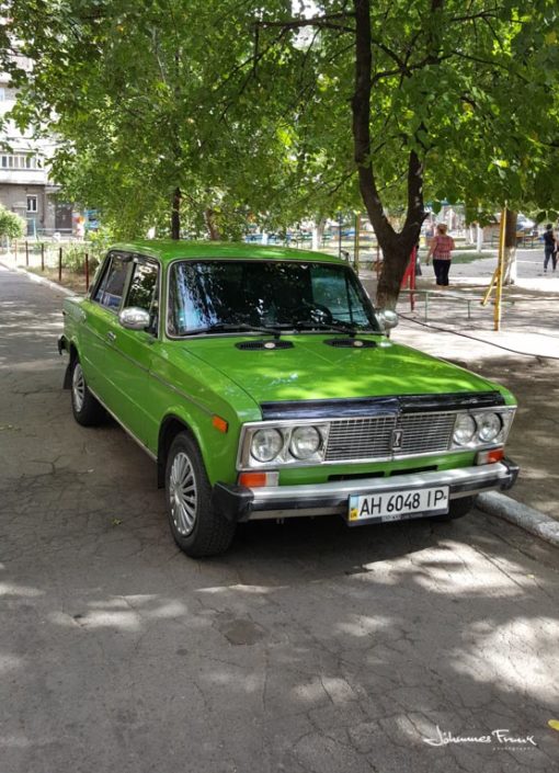 Green Lada in a park in Mariupol johannesfrank